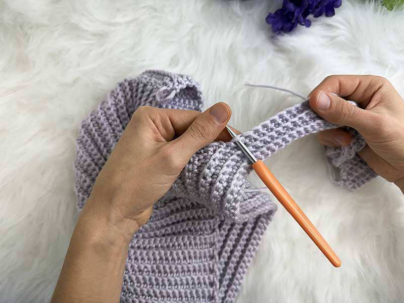 crochet edging of the hooded bonnet