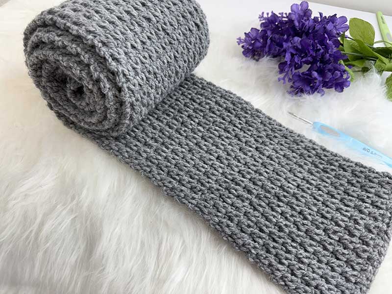 crochet men's one row scarf - rolled up view