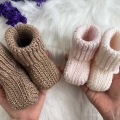 Two pairs of crochet ribbed baby booties