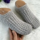 everyday crochet slippers on mannequin feet - close-up view