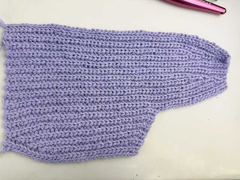 finished back half with an earflap of the crochet kitty hat